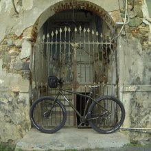 Surly ECR bike by an antique gate in Charlotte Amalie
